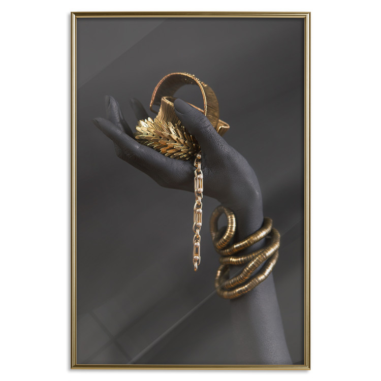 Wall Poster Royal Gifts - black hand with golden accessories on a dark background 130516 additionalImage 21