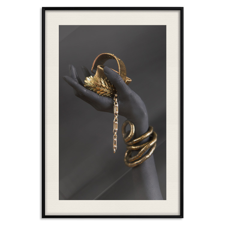 Wall Poster Royal Gifts - black hand with golden accessories on a dark background 130516 additionalImage 19