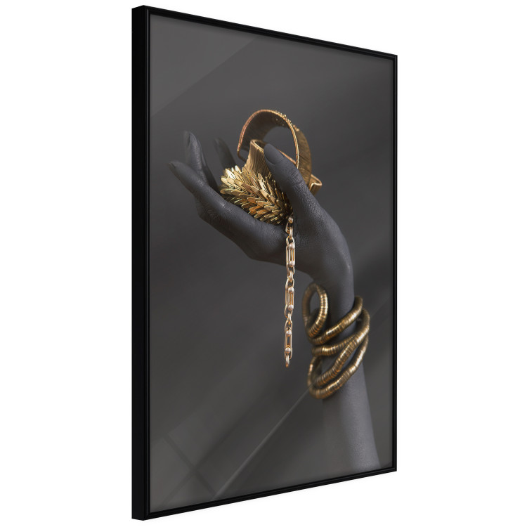 Wall Poster Royal Gifts - black hand with golden accessories on a dark background 130516 additionalImage 11