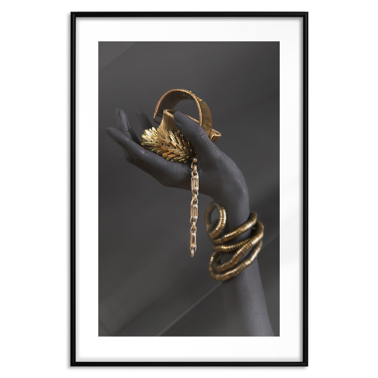 Wall Poster Royal Gifts - black hand with golden accessories on a dark background 130516 additionalImage 15