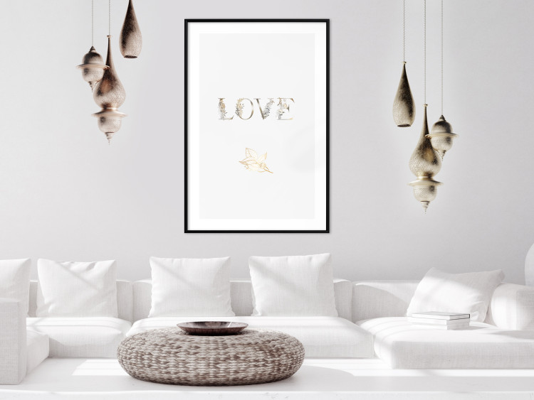 Wall Poster Love Is Strength - golden English text on a solid white background 131916 additionalImage 23