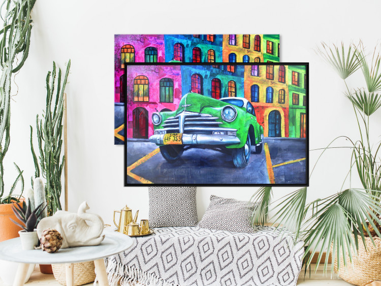 Wall Poster American Classic - green car against a background of colorful architecture 126536 additionalImage 6