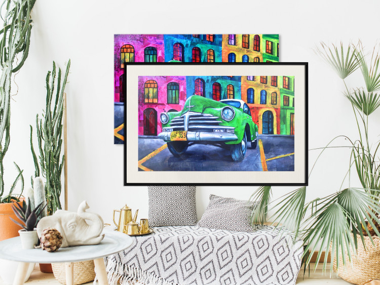 Wall Poster American Classic - green car against a background of colorful architecture 126536 additionalImage 24