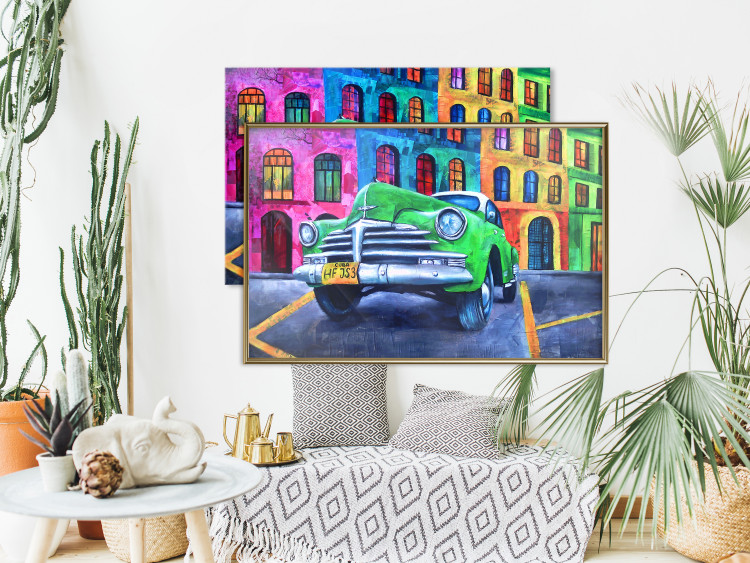 Wall Poster American Classic - green car against a background of colorful architecture 126536 additionalImage 7