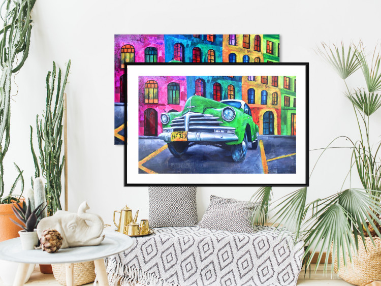 Wall Poster American Classic - green car against a background of colorful architecture 126536 additionalImage 18