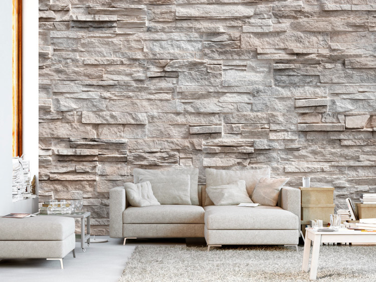 Photo Wallpaper Enchantment - beige background with irregular texture of stone blocks 97946