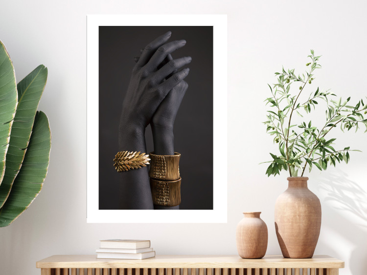 Poster Exotic Duet - black hands with golden accents on a dark background 130456 additionalImage 5