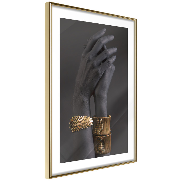Poster Exotic Duet - black hands with golden accents on a dark background 130456 additionalImage 9