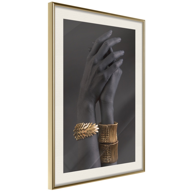 Poster Exotic Duet - black hands with golden accents on a dark background 130456 additionalImage 3