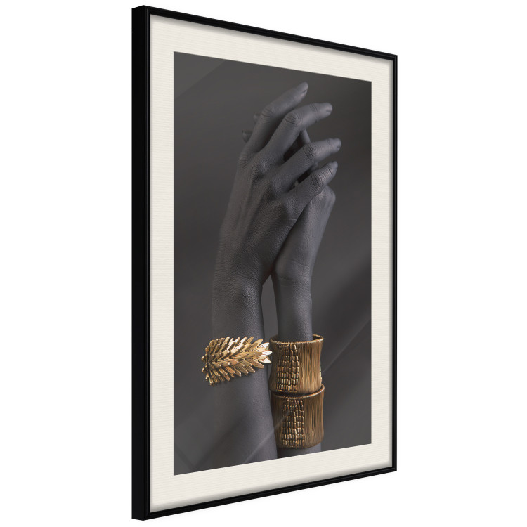 Poster Exotic Duet - black hands with golden accents on a dark background 130456 additionalImage 2