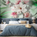 Wall Mural Magnolias on a branch - white flowers on a background of green patterns with sparkle 62466 additionalThumb 2