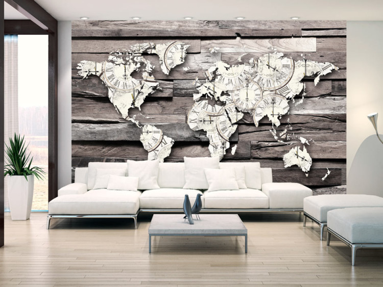Wall Mural Passing time of the Earth - map of the world with a clock motif on grey wood 63866