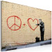 Canvas Print Peaceful Doctor (Banksy) - street art of a man on a brick wall 132476 additionalThumb 2