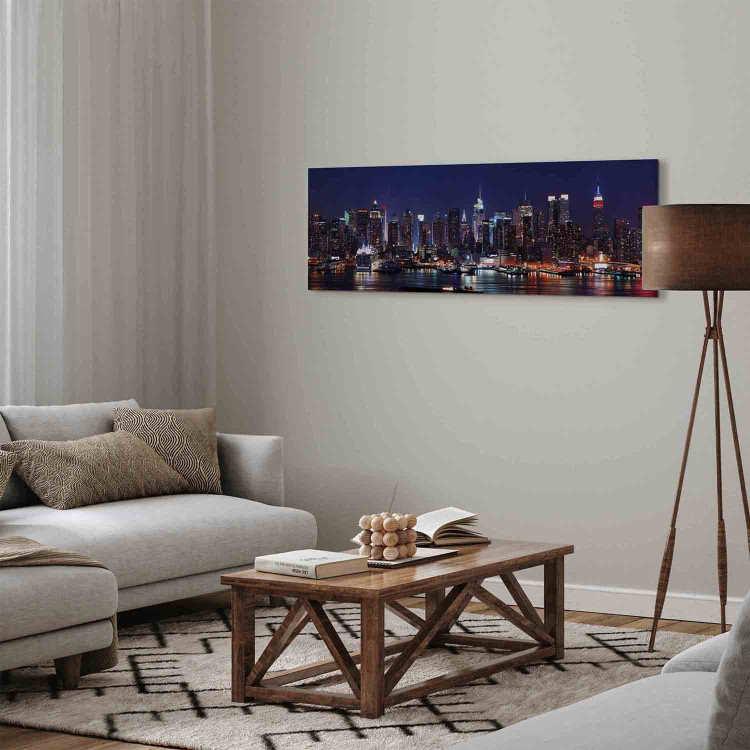 Canvas Art Print Nightlife (1-piece) - New York City skyline and skyscrapers over calm water 149076 additionalImage 3