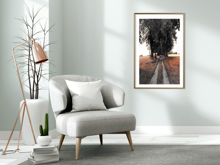 Wall Poster Road to the Forest - landscape of road and trees against orange meadow 124386 additionalImage 15