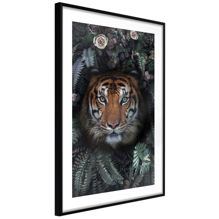 Poster Tiger in Leaves - portrait of a tiger against a background of green plants and flowers 138696 additionalImage 5
