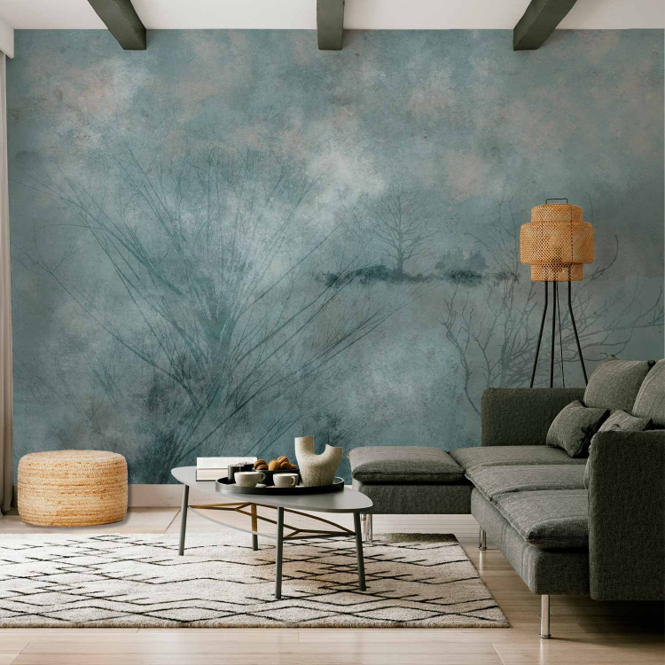 Wall Mural Winter abstraction - landscape with leafless trees in blue 143937