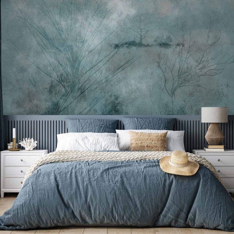 Wall Mural Winter abstraction - landscape with leafless trees in blue 143937 additionalImage 2