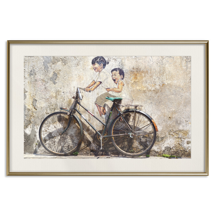 Wall Poster Carefree - retro black bicycle against a wall painted with children 130457 additionalImage 20