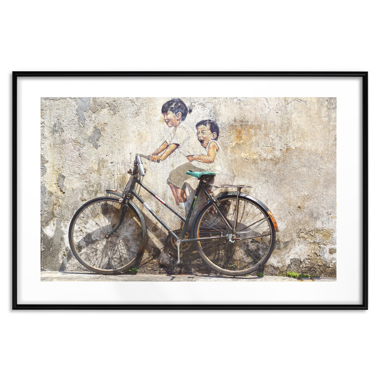 Wall Poster Carefree - retro black bicycle against a wall painted with children 130457 additionalImage 17