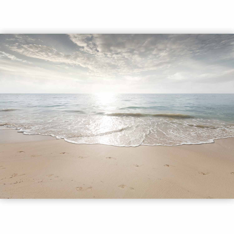 Wall Mural Sand and sun - landscape with calm sea and beach with footprints 144057 additionalImage 1