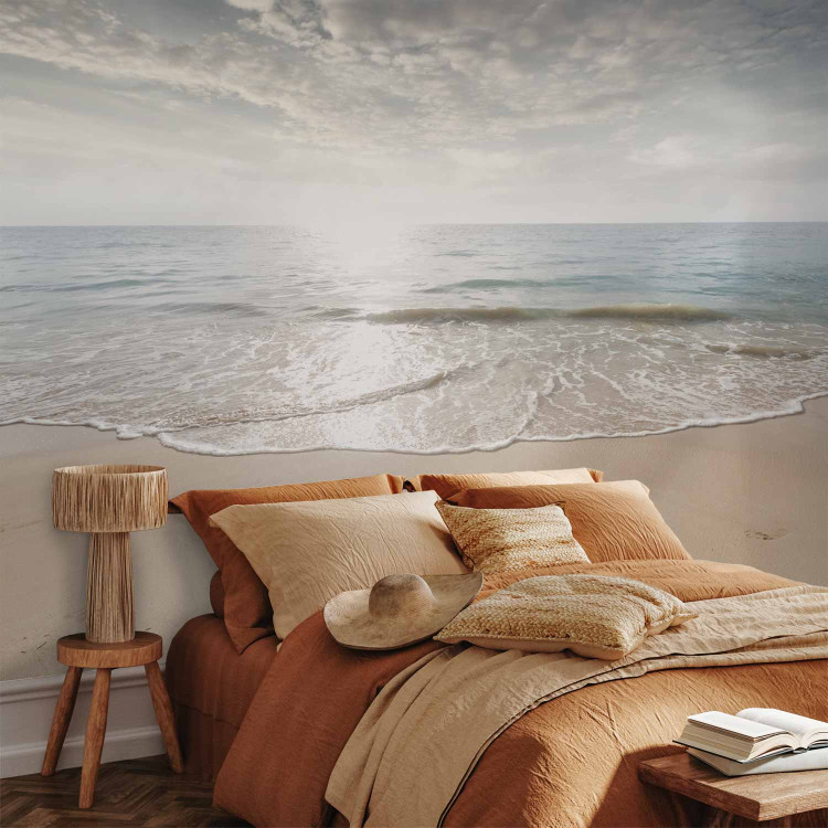 Wall Mural Sand and sun - landscape with calm sea and beach with footprints 144057 additionalImage 2
