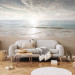 Wall Mural Sand and sun - landscape with calm sea and beach with footprints 144057