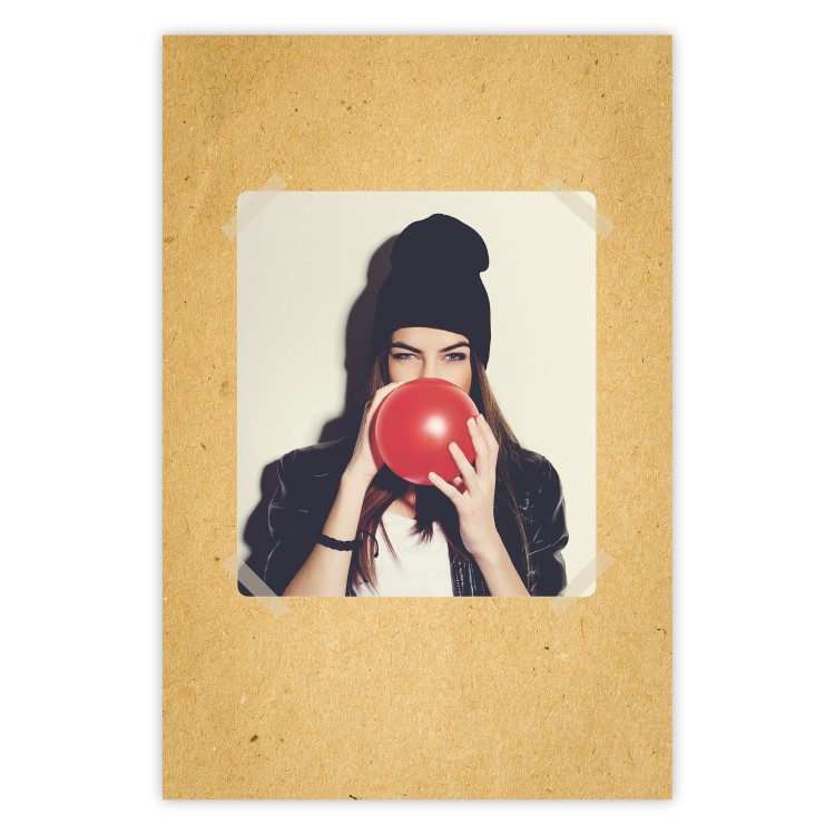 Poster Photo Portrait - figure of a young woman blowing a balloon against a cardboard background 117467