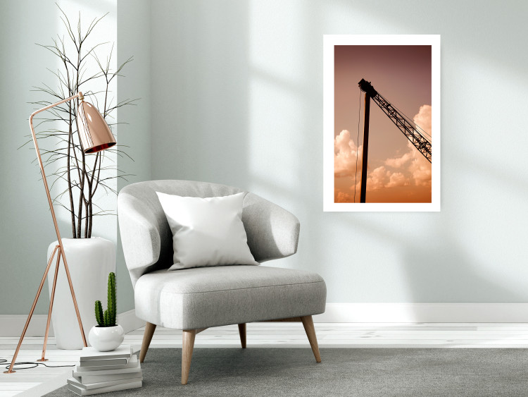Poster Cloud Arrangement - landscape of orange sky with construction crane 124387 additionalImage 2