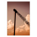 Poster Cloud Arrangement - landscape of orange sky with construction crane 124387
