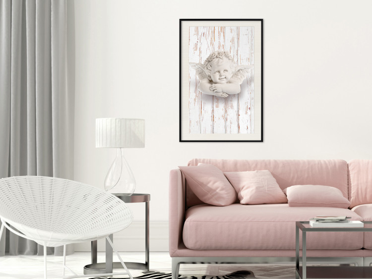 Poster Happy Dawn - sculpture of an angel on a white wooden texture background 125228 additionalImage 22