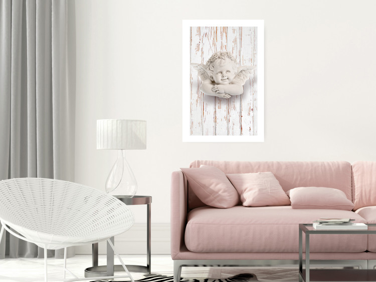 Poster Happy Dawn - sculpture of an angel on a white wooden texture background 125228 additionalImage 4