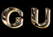 Poster Gucci - golden English text with glitter on a solid black background 130338 additionalThumb 10