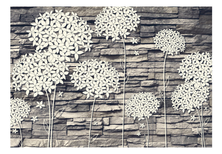 Wall Mural Stone Composition - white flowers on a backdrop of gray stone wall 64538 additionalImage 1