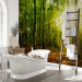 Wall Mural Sunlight penetrating through the treetops - landscape of green forest and leaves 138048 additionalThumb 8