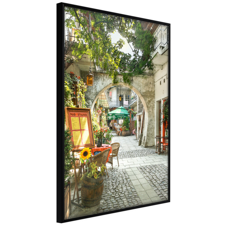 Wall Poster Krakow: Sunny Pub - colorful frame with a charming alley and architecture 118158 additionalImage 12