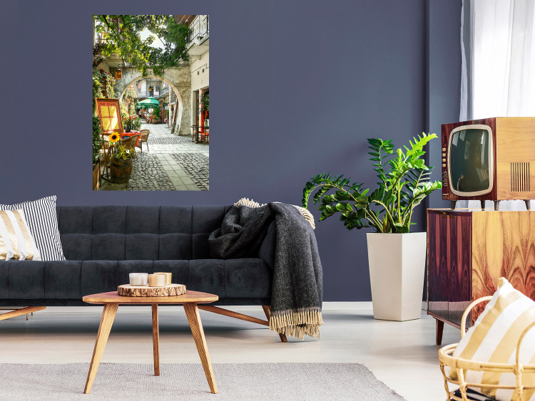 Wall Poster Krakow: Sunny Pub - colorful frame with a charming alley and architecture 118158 additionalImage 23