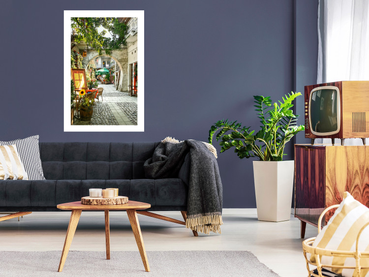 Wall Poster Krakow: Sunny Pub - colorful frame with a charming alley and architecture 118158 additionalImage 2