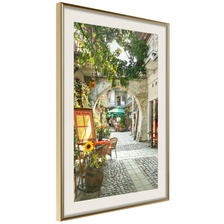 Wall Poster Krakow: Sunny Pub - colorful frame with a charming alley and architecture 118158 additionalImage 2