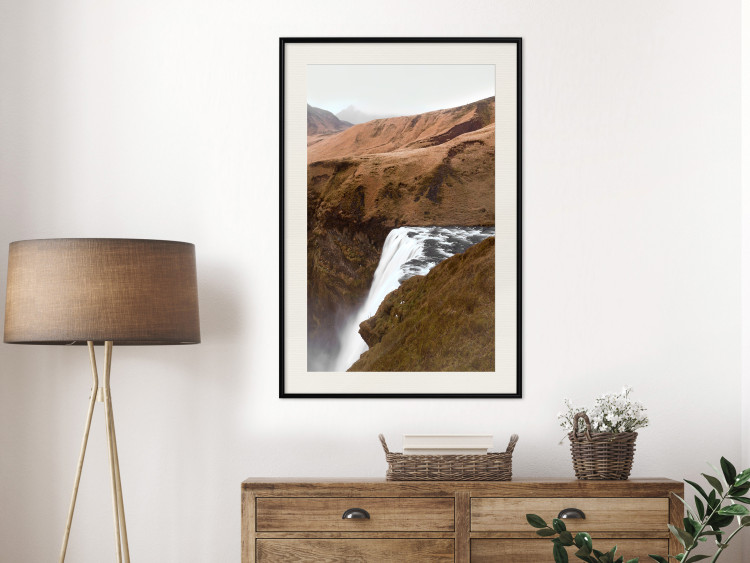 Poster Rusty Hills - landscape of a river forming a waterfall against brown mountains 130268 additionalImage 23