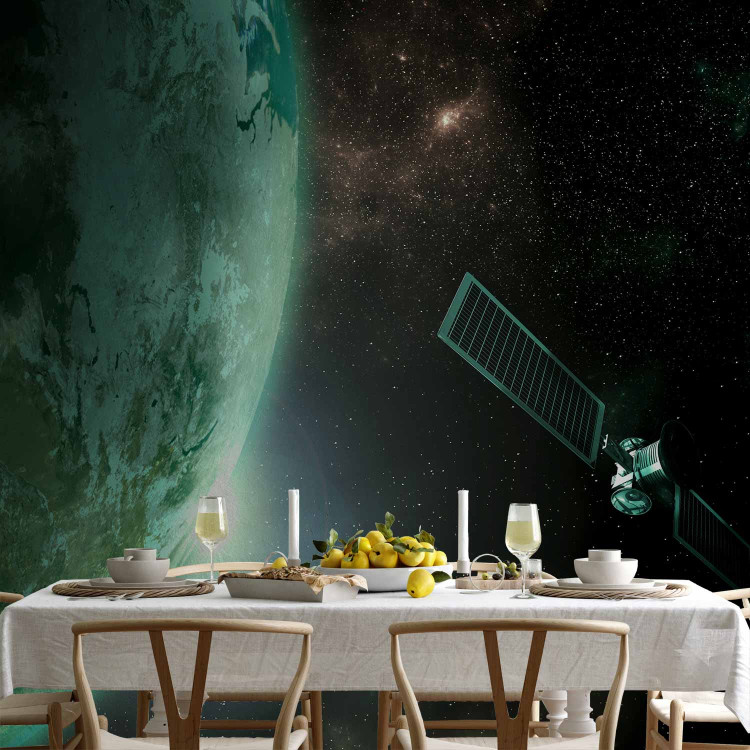 Wall Mural Universe - cosmic landscape with stars, green Earth, and a satellite 64568 additionalImage 6