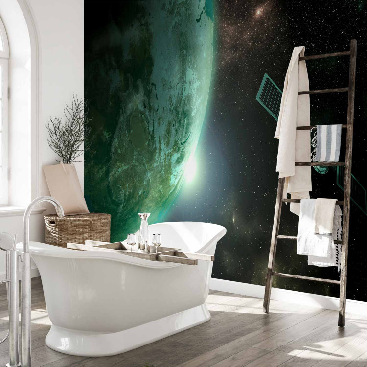 Wall Mural Universe - cosmic landscape with stars, green Earth, and a satellite 64568 additionalImage 8
