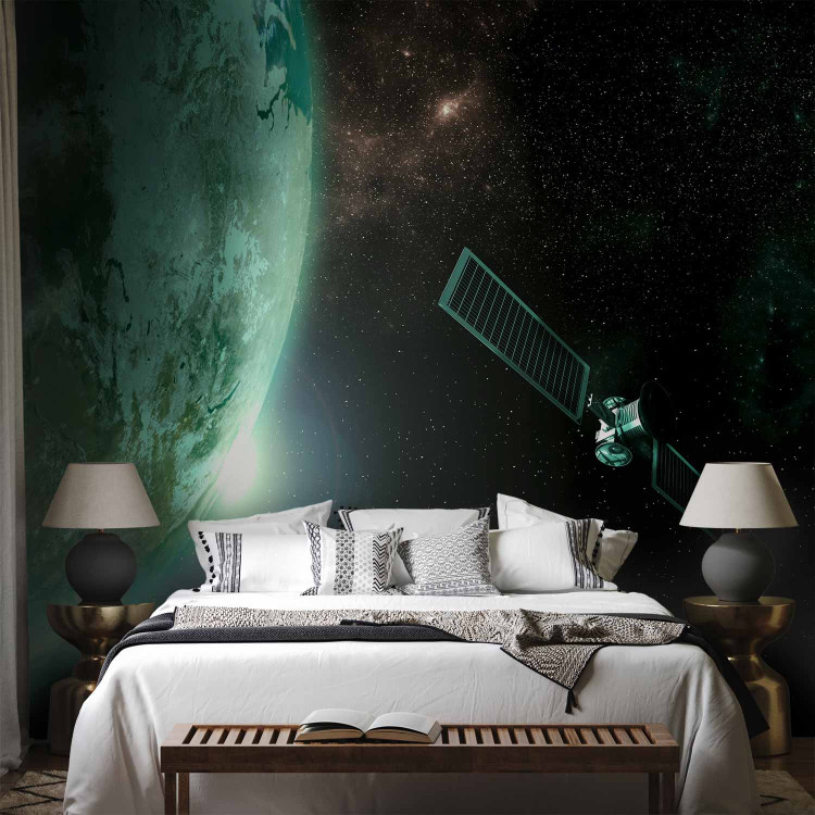 Wall Mural Universe - cosmic landscape with stars, green Earth, and a satellite 64568 additionalImage 2