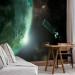 Wall Mural Universe - cosmic landscape with stars, green Earth, and a satellite 64568 additionalThumb 4