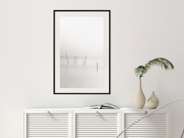 Wall Poster Misty Trail - landscape of sticks protruding from the water on a white background 130378 additionalImage 25