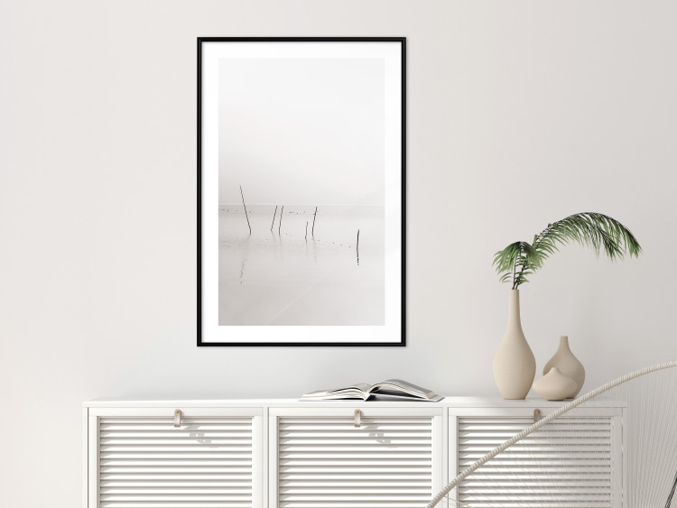 Wall Poster Misty Trail - landscape of sticks protruding from the water on a white background 130378 additionalImage 23