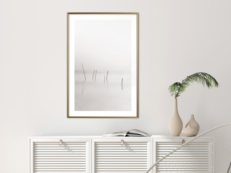 Wall Poster Misty Trail - landscape of sticks protruding from the water on a white background 130378 additionalImage 13
