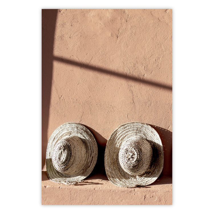 Poster Sunlit Couple - two hats in the sunlight against a wall 129509