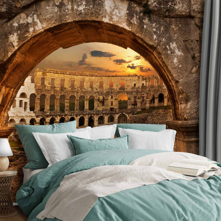 Wall Mural Ancient architecture - Pula amphitheatre against a sunset background 97529 additionalImage 2
