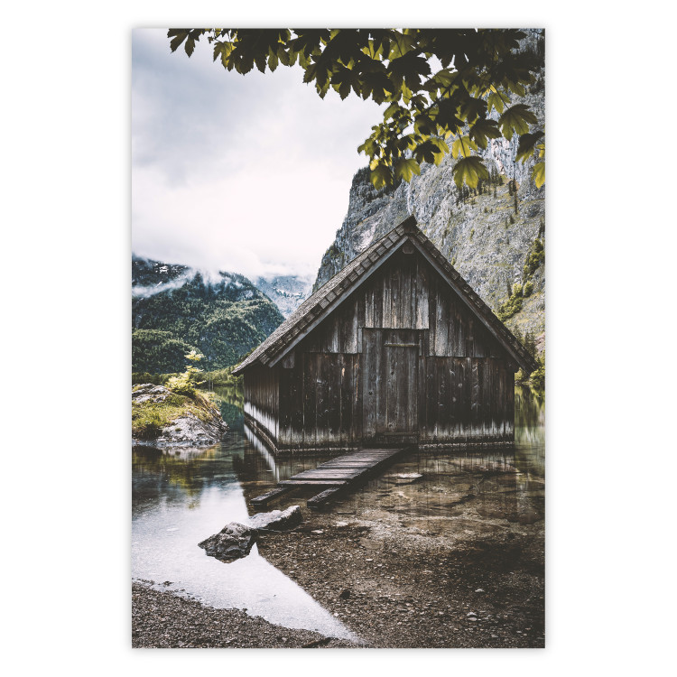 Wall Poster Mountain House - dark wooden cabin against a forest and mountain landscape 126839